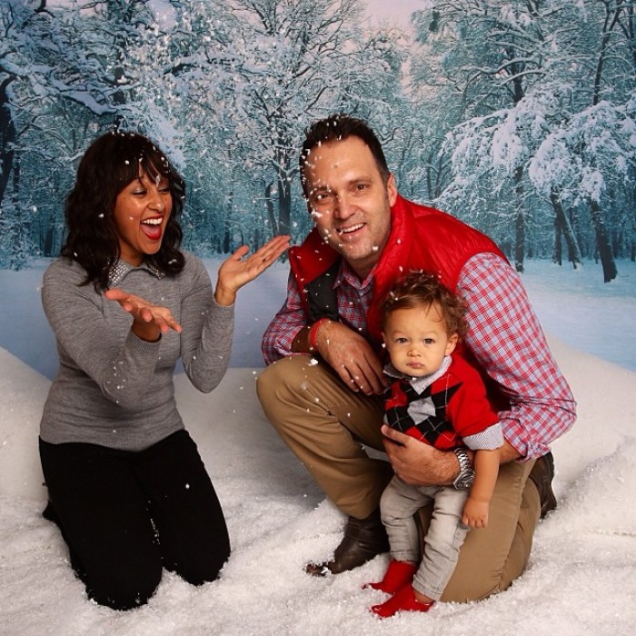 Tamera Mowry-Housley and husband Adam Housley with their son Aden.