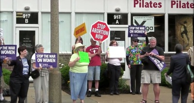 Pro-life and pro-choice supporters rally outside an abortion clinic in Oak Park, Illinois on June 26th, 2013.