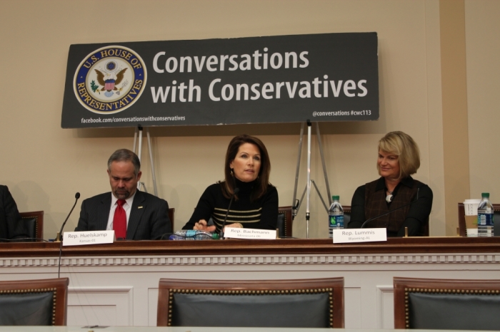 Representative Michele Bachmann (R-MINN) speaks about Obamacare at the Heritage Foundation's 'Conversations with Conservatives' event on Capitol Hill Wednesday. Representative Cynthia Lummis (R-WYOM), and Representative Tim Huelskamp (R-KAN), listen and respond.