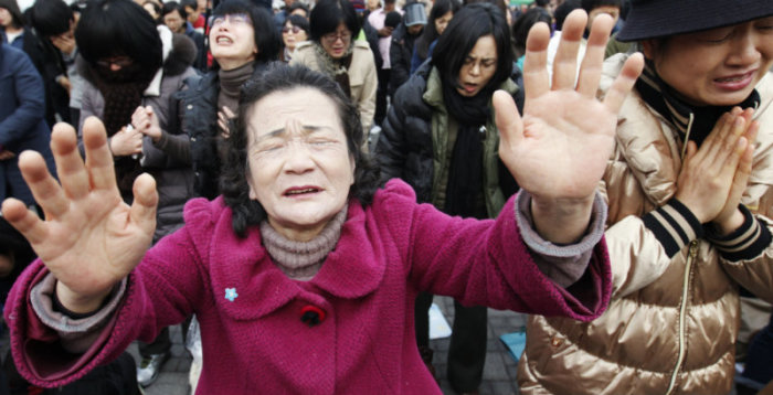 Christians pray for starving North Koreans during a prayer session in Seoul March 1, 2012. About 300 South Korean Christians also asked China not to send North Koreans detained in China back to the North, saying the North Koreans might be executed after their repatriation.