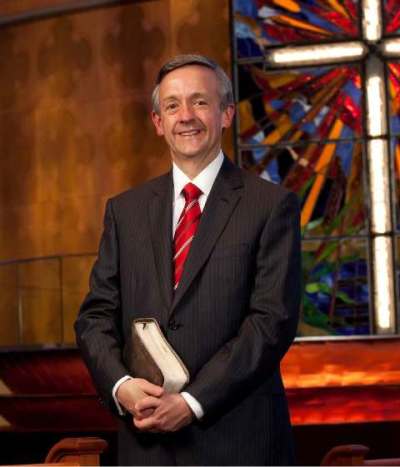 Pastor Robert Jeffress in front of the baptistry at First Baptist Church in Dallas, Texas.