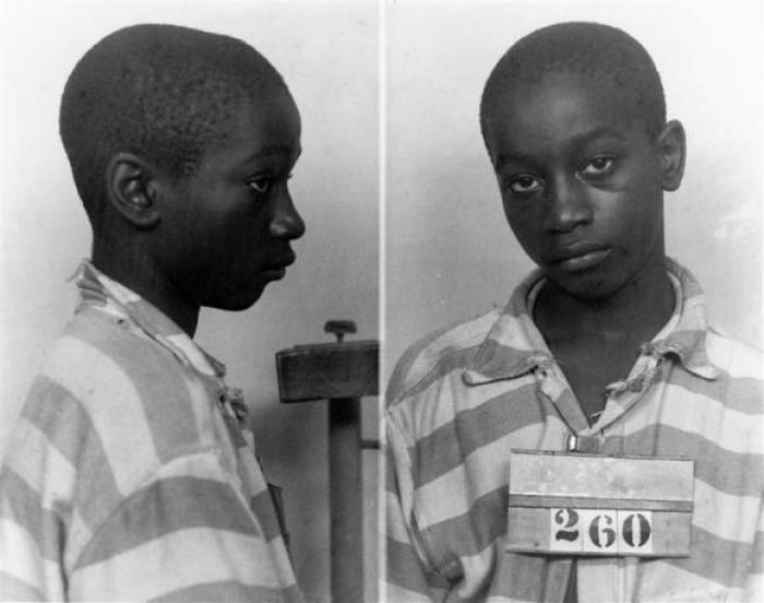 George Stinney Jr appears in an undated police booking photo provided by the South Carolina Department of Archives and History. Attorneys in South Carolina say they have found fresh evidence that warrants a new trial in the case of a 14-year-old black teenager put to death nearly 70 years ago for the murders of two white girls. George Stinney Jr. was the youngest person to be executed in the United States in the last century, and attorneys say the request for another trial so long after a defendant's death is the first of its kind in South Carolina.