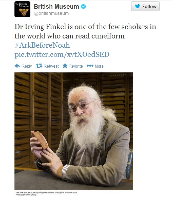 Dr. Irving Finkel, of the British Museum in London, holds a small 4,000-year-old Mesopotamian tablet written in cuneiform that recounts instructions given by a god for building a vessel, similar to the Biblical account of Noah's ark.