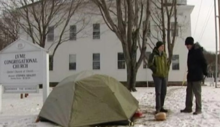 The Rev. Steve Gehlert of Congregational Church in Lyme, N.H., (r), slept in a tent outside his church for one week to raise awareness about homelessness in his community, Jan. 23, 2014.