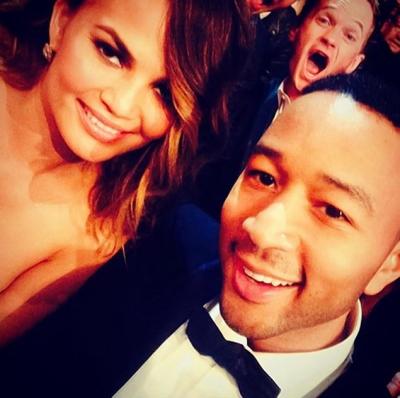 Chrissie Teigen, John Legend photobombed by Neil Patrick Harris at the 2014 Grammy Awards.