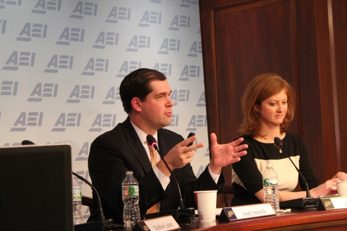 Andy Smarick, partner at Bellwether Education Partners, speaks at an American Enterprise Institute panel on school choice, Thursday, January 30, 2014. Kara Kerwin, president of the Center for Education Reform, looks on.