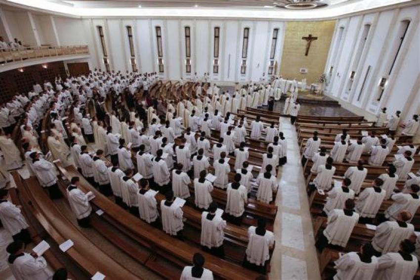 Priests enter in procession for a mass led by Father Eduardo Robles Gil, the new leader of the Legionaries of Christ order, in the order seminary in Rome February 6, 2014.