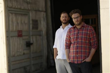 Directors and writers Seth Rogen (R) and Evan Goldberg pose for a portrait while promoting their upcoming movie "This Is the End" at Sony Studios in Culver City, California, June 3, 2013.