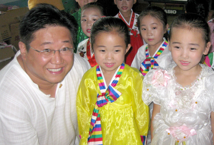 Kenneth Bae is seen here in this undated photo with North Korean children.