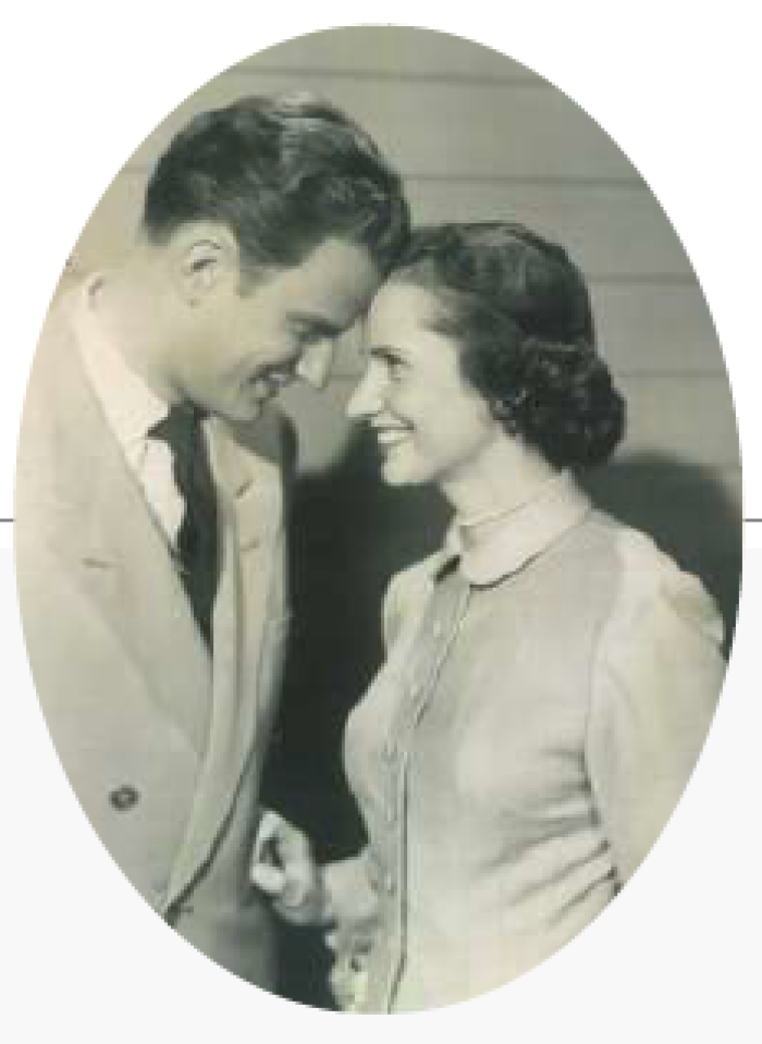 Ruth and Billy Graham grin at each other in this romantic shot.