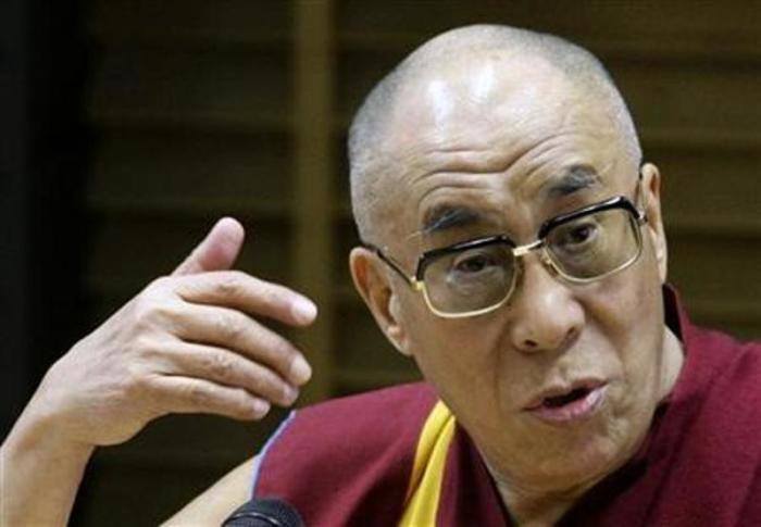 Tibetan spiritual leader the Dalai Lama gives a lecture at the University of Warsaw July 28, 2009.