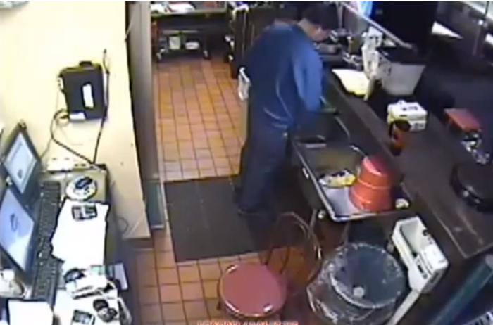 A district manager of a Pizza Hut store in Kermit, W.Va., is caught peeing in the sink where utensils are washed.