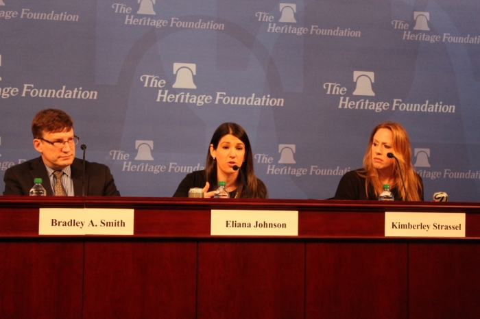 National Review Media Editor Eliana Johnson speaks at the IRS targeting panel at The Heritage Foundation in Washington, DC on Friday. Bradley A. Smith, and Kimberley Strassel look on.