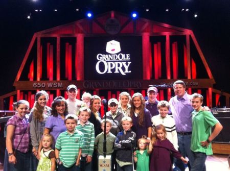 Duggar family of the TLC reality TV show "19 Kids and Counting" at the Grand Ole Opry in Nashville, Tenn. The Duggar family has been featured on the TLC network since 2004.