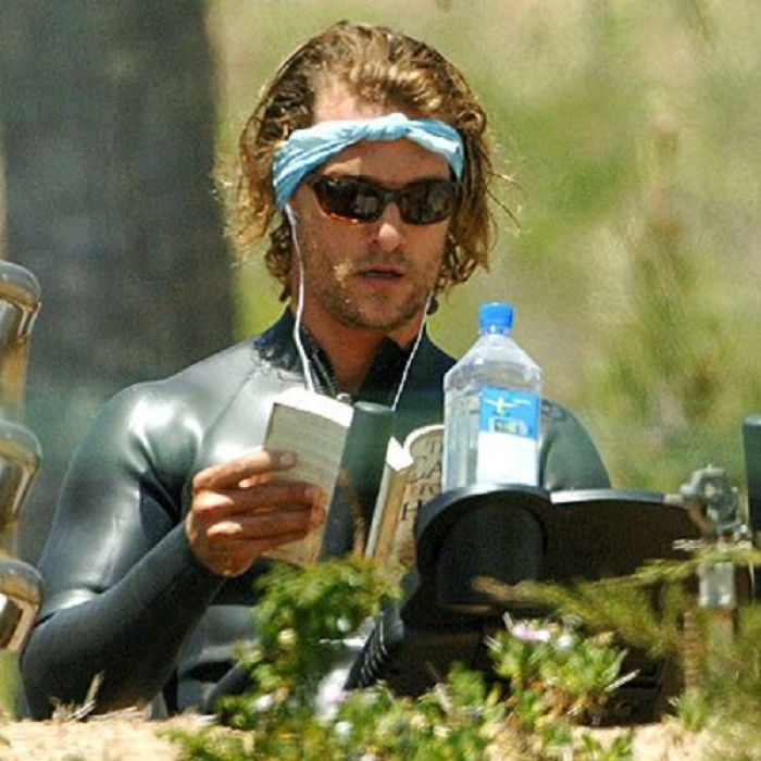 Oscar winner, actor Matthew McConaughey, 44, reads Lee Strobel's 'The Case for Christ' while working out recently.