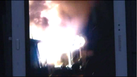 A screen grab from amateur video of the raging fire March, 6, 2014.