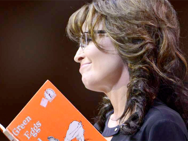 Former Alaska Governor Sarah Palin parodies a reading of Dr. Seuss' book 'Green Eggs and Ham' as she criticizes President Barack Obama's administration at the Conservative Political Action Conference (CPAC) in Oxon Hill, Maryland, March 8, 2014.