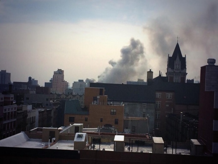 An building burns in East Harlem between 116th and Park Avenue on March, 12, 2014.