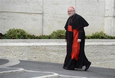 Cardinal Reinhard Marx of Germany arrives for a meeting in the Synod Hall at the Vatican March 8, 2013