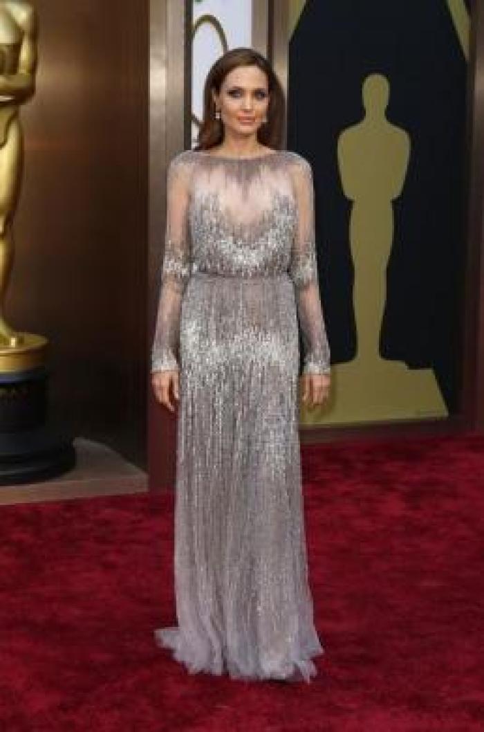 Angelina Jolie in a gray sequined Elie Saab gown.