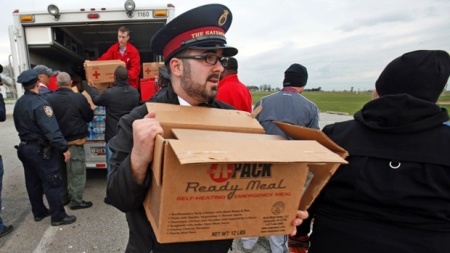 The Salvation Army delivers "ready pack meals" to be donated just in time for the Christmas season.