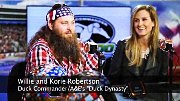 Willie and Korie Robertson, stars of A&E's hit show 'Duck Dynasty,' appear on the Texas Motor Speedway's new 'Big Hoss' TV, the biggest TV in the world, Wednesday night.