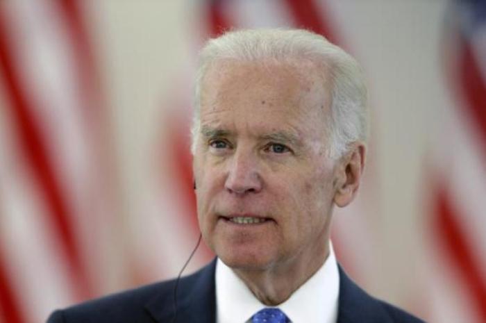 U.S. Vice President Joe Biden listens during a news conference in Vilnius, N.H., March 19, 2014.