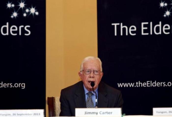 Former U.S. president Jimmy Carter speaks during the news conference in Yangon, Burma, Sept. 26, 2013.