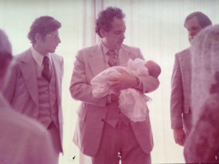Elizabeth Esther: 'This is the day I was 'dedicated' to God during our Sunday Morning Worship service in The Assembly. My grandfather, George Geftakys, is holding me. My Dad is to his right. I am 3-months old.'