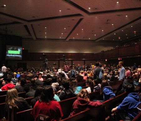 Attendees fill into the Hylton Memorial Chapel in Woodbridge for "Reverse", a youth event organized by Dare 2 Share Ministries on the evening of Friday, March 28, 2014.