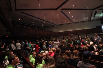 Thousands of youth fill into the main auditorium of a Woodbridge, Va., church.