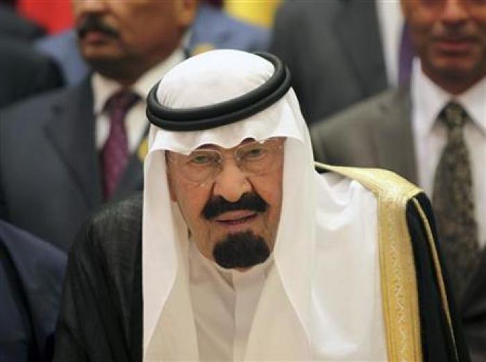 Saudi Arabia's King Abdullah arrives at the the opening ceremony of the Organisation of Islamic Conference (OIC) summit in Mecca August 14, 2012.