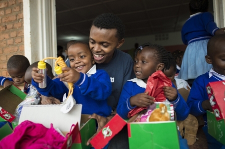 Rwandan genocide survivor Alex Nsengimana extends hope to other children facing desperate circumstances through a simple gift-filled shoebox.