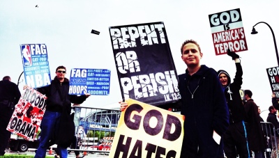 Members of Westboro Baptist Church in Topeka, Kan., protest outside At&T Stadium in Arlington, Texas, during the NCAA's March Madness Final Four games on April 5, 2014.