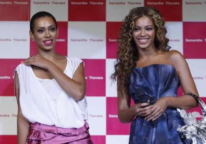 Singer Beyonce Knowles (R) and her sister Solange attend a promotional event for Japan's fashion brand Samantha Thavasa's new collection in collaboration with Disney in Chiba, east of Tokyo August 10, 2009.