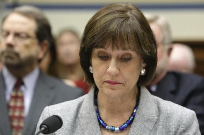 U.S. Director of Exempt Organizations for the Internal Revenue Service, Lois Lerner, takes her seat before a House Oversight and Government Reform Committee hearing on alleged targeting of political groups seeking tax-exempt status by the IRS, on Capitol Hill in Washington, May 22, 2013.