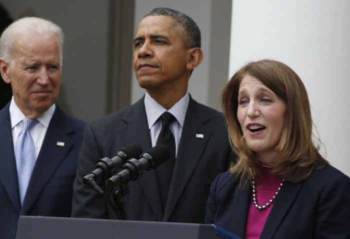 U.S. President Barack Obama announces Director of the Office of Management and Budget Sylvia Mathews Burwell (R) as his nominee to replace outgoing U.S. Secretary of Health and Human Services Kathleen Sebelius (not seen), during a ceremony in the Rose Garden of the White House in Washington, April 11, 2014. At left is U.S. Vice President Joseph Biden.