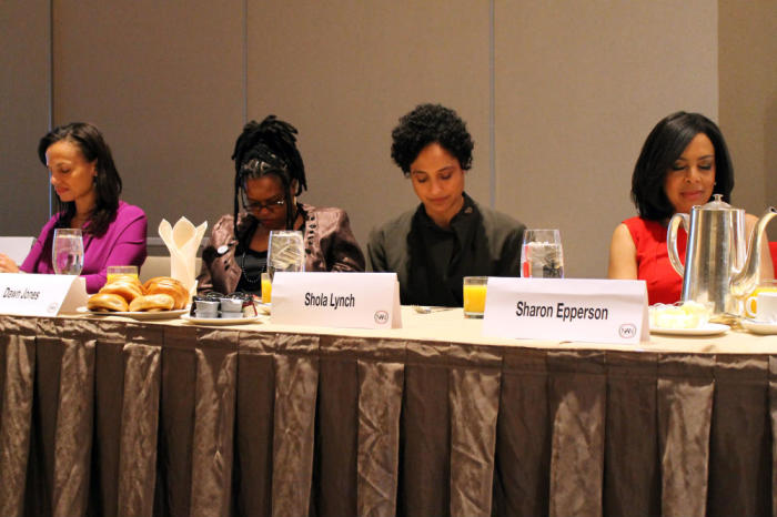 (L-R) Alexis McGill Johnson, Dawn Jones, Shola Lynch, and Sharon Epperson bow their heads during the invocation at the Women's Power Breakfast Thursday, April 10, 2014, during the 16th annual the National Action Network convention at Sheraton Times Square hotel in New York City.