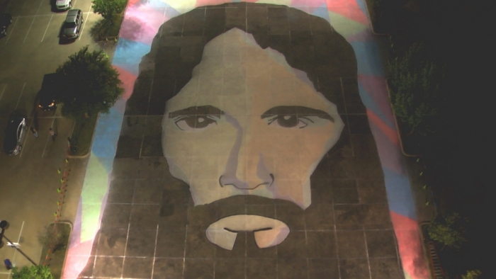 Giant chalk drawing of Jesus Christ at Fellowship Church in Grapevine Texas, colored on Apr. 16, 2014.