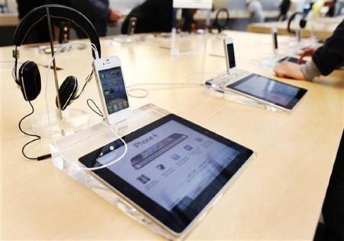 A dedicated iPad station is seen in front of an iPhone at the Apple store in New York May 23, 2011.