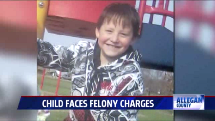 Edward Hart, 8, faces two felony charges in Allegan County, Mich., after an altercation with local police on March 19, 2014.