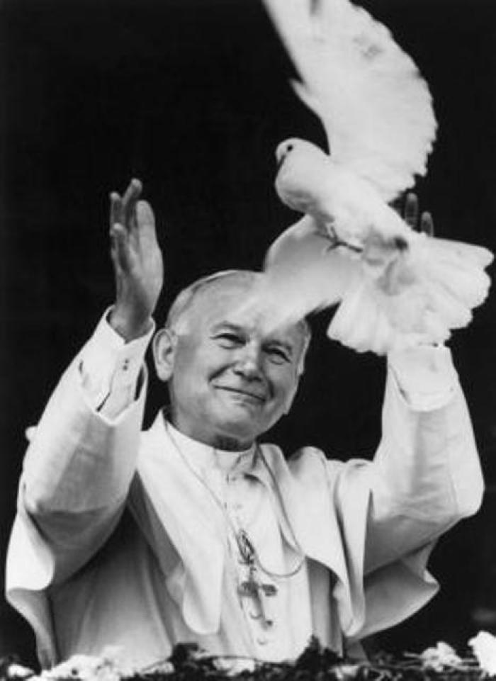 Pope John Paul II releases a dove during ceremonies in Guasmo, a poor suburb of Guayaquil, Ecuador, Feb. 12, 1985.