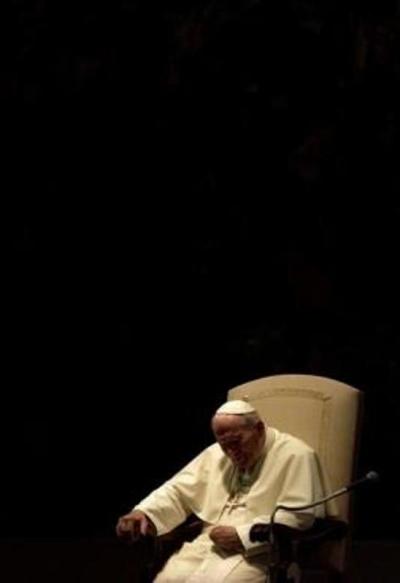 Pope John Paul II concentrates during his weekly general audience in Vatican Aug. 8, 2001.