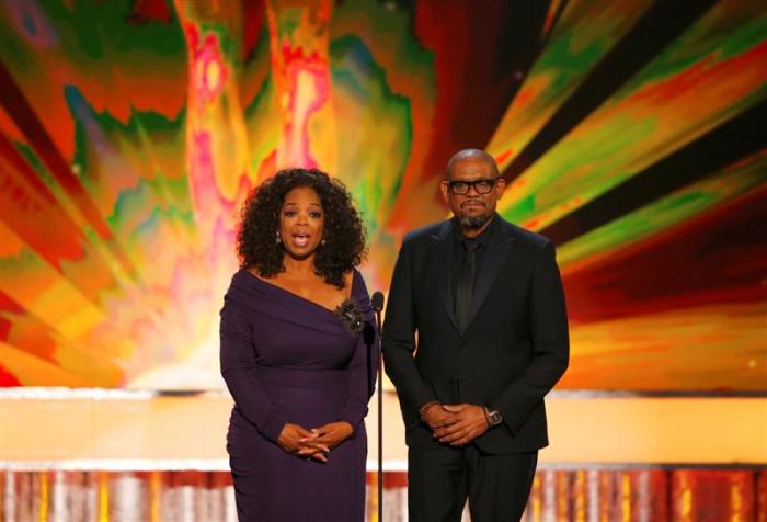 Actors Oprah Winfrey and Forest Whitaker at the 20th annual Screen Actors Guild Awards in Los Angeles on Jan. 18, 2014.