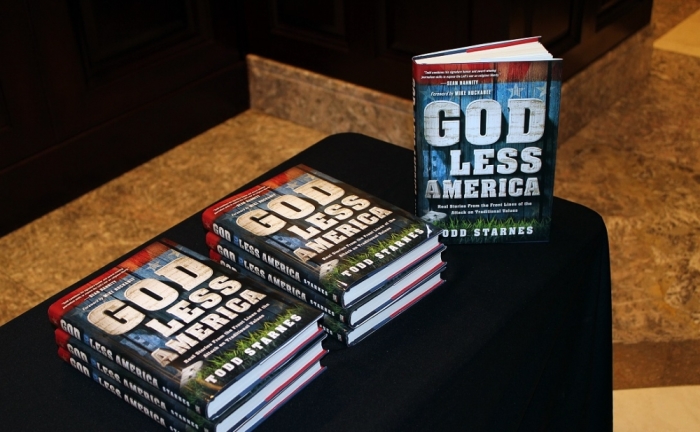 Copies of Todd Starnes' latest book, 'God Less America', at the Washington, DC office of the Family Research Council in May 2014.
