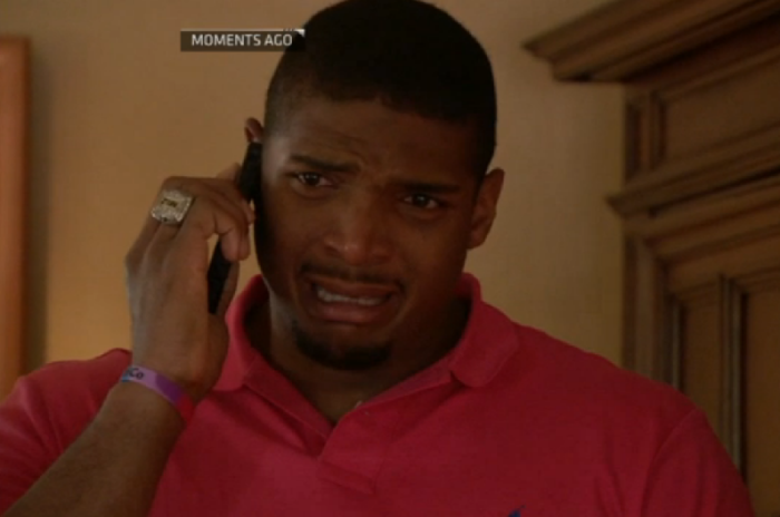 Openly gay Missouri defensive end, Michael Sam reacts to learning that the St. Louis Rams made him the 249th overall choice in the 2014 NFL draft.