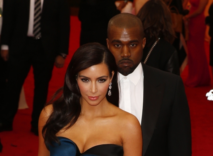 Kim Kardashian and Kanye West arrive at the Metropolitan Museum of Art Costume Institute Gala Benefit celebrating the opening of 'Charles James: Beyond Fashion' in Upper Manhattan, New York, May 5, 2014.
