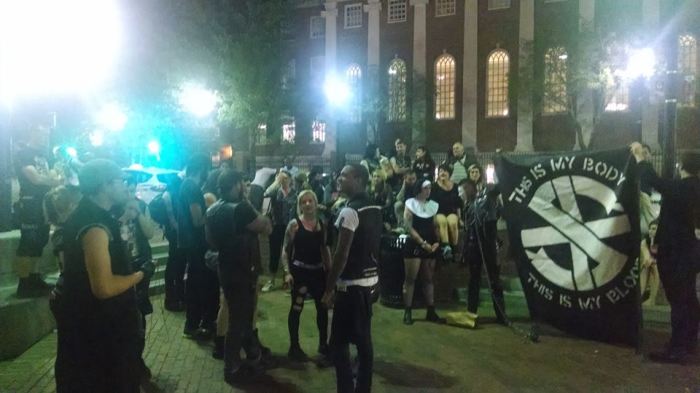 Satanic rights activists outside Harvard Square, after the 'black mass' was cancelled by Harvard.