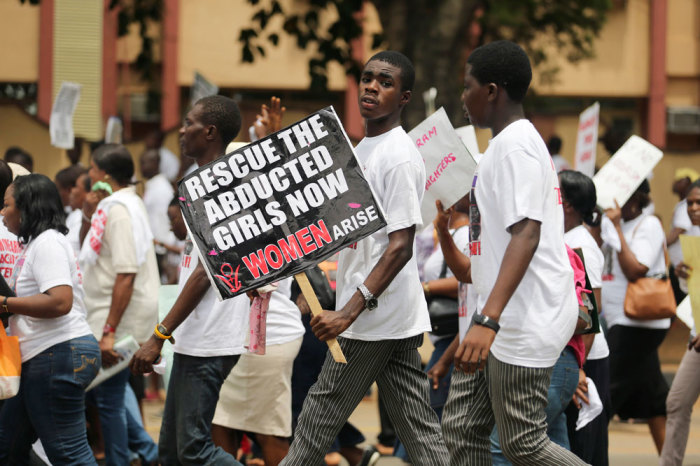 Students join a protest demanding the release of the abducted secondary school girls in the remote village of Chibok, along a road in Lagos May 12, 2014. The leader of the Nigerian Islamist rebel group Boko Haram has said he will release more than 200 schoolgirls abducted by his fighters last month in exchange for prisoners, according to a video seen by Agence France-Presse on Monday.