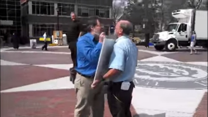Professor of anthropology, James Boster angrily confronts evangelists at the University of Connecticut in a video posted to YouTube on April 23, 2014.